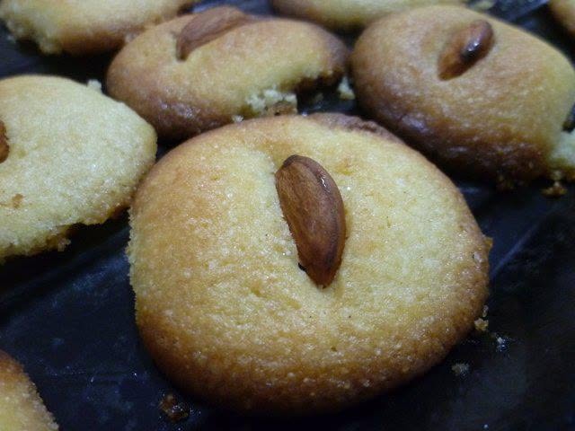 Homemade almond crescents dusted with icing sugar.