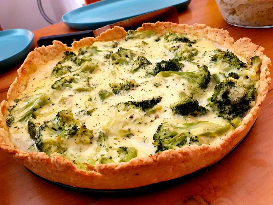 Homemade broccoli tart with a creamy filling.