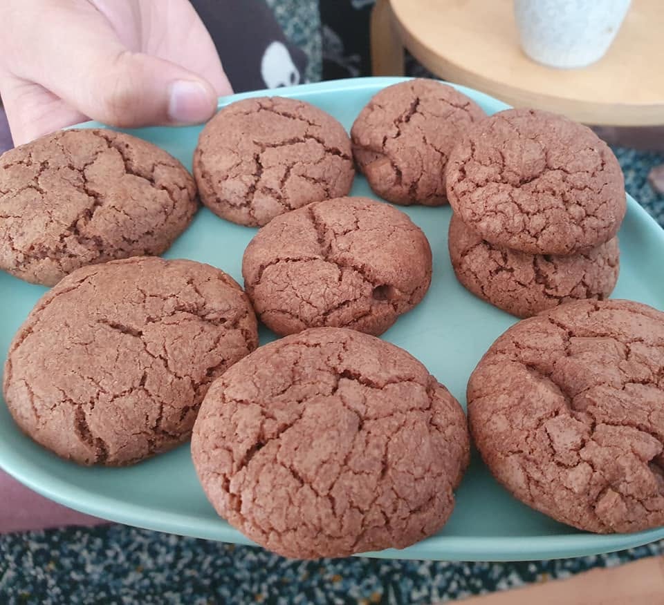A plate of homemade chunky chocolate cookies.
