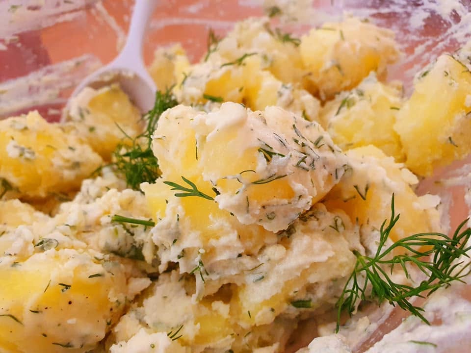 Warm potato salad with fresh dill.